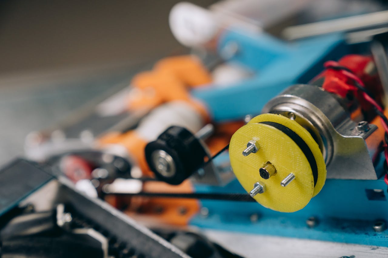home-hero Detailed view of machine gears and components, focusing on engineering elements.